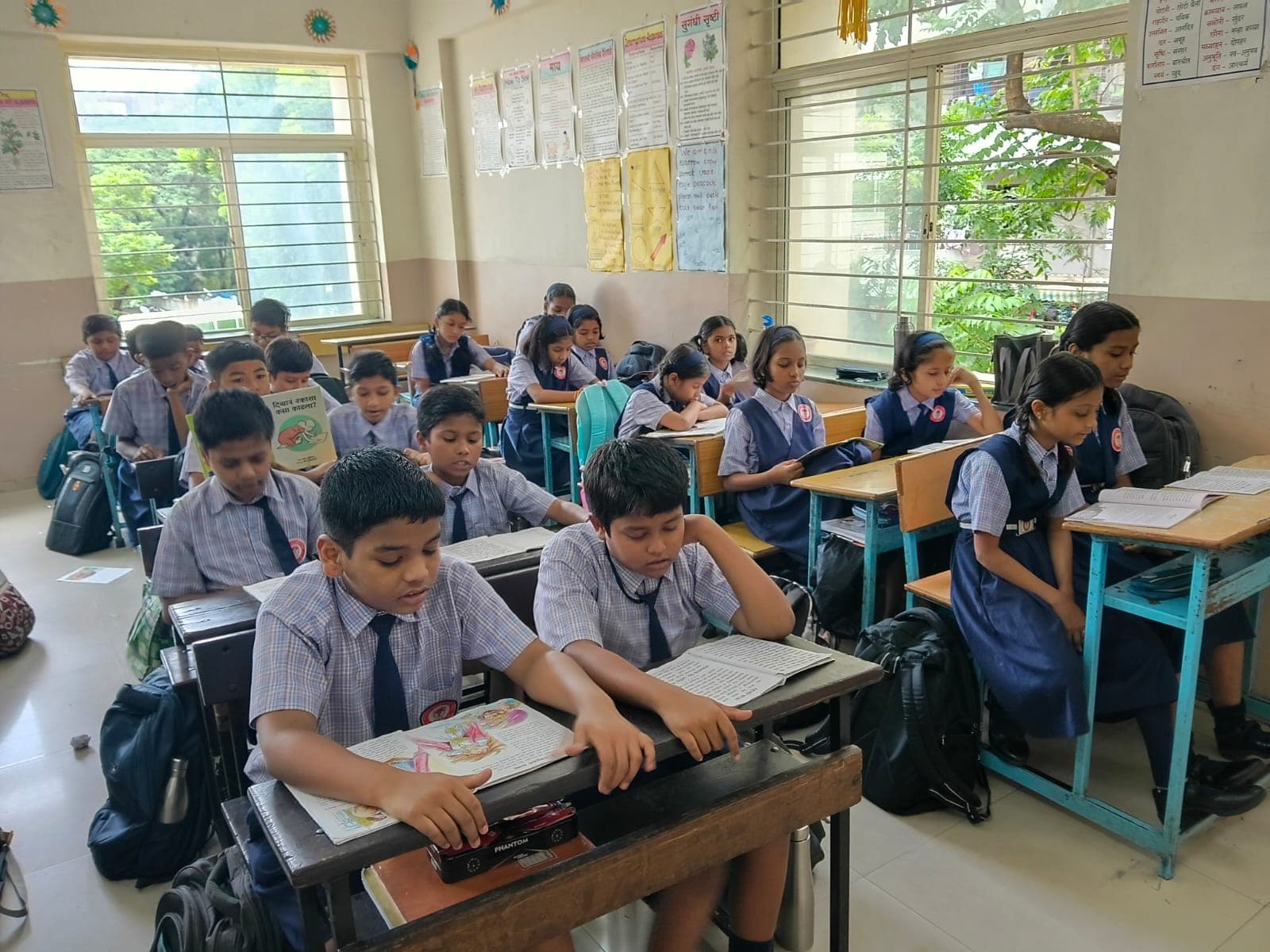 Students reading together in class
